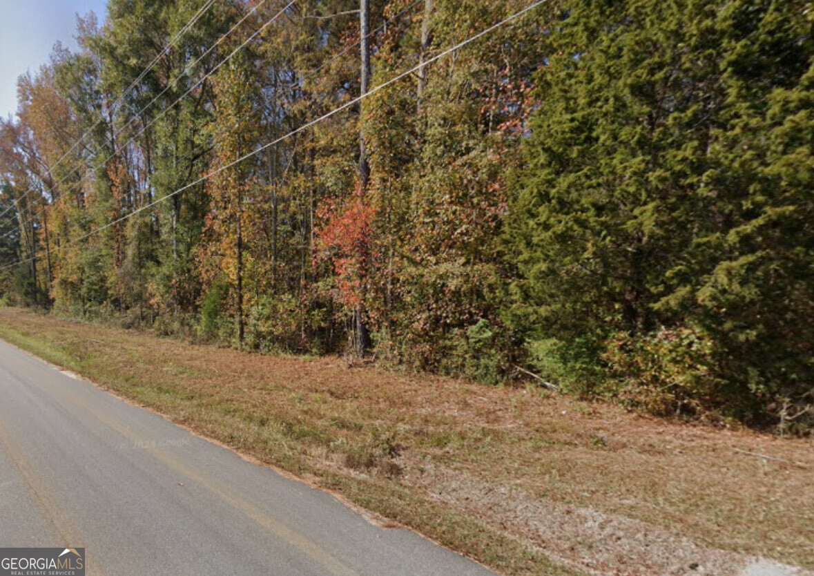 Build Without Limits on City Pond Rd! Seize the freedom to design exactly what you want on this 1.9-acre, unrestricted parcel in Oxford's scenic Newton County. Outside the city limits-no HOA. Level, lightly wooded topography offers multiple homesites plus room for a workshop, garden, animals, or hobby farm. Paved road frontage with public water & power at the street; soils are suitable for a septic system. Live minutes from Covington's historic square, downtown Oxford, and I-20 for an easy ~45-minute commute to Atlanta. Weekend adventures await at nearby City Pond Park, the Oxford Trail, and sparkling Carters Lake. Rare chance to own versatile land in a fast-growing area-bring your plans and start crafting a lifestyle without rules! Sale price $59,990.