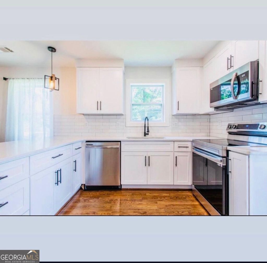 Photo of 2235 Baker Road NW, Atlanta, GA 30318 (MLS # 10719939)