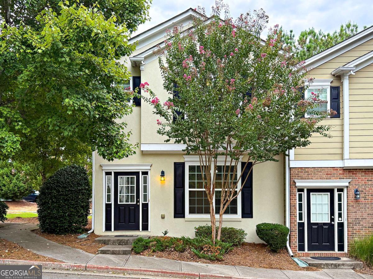 Ready for a change? This move-in ready, end unit town home is ready for you! The open concept floor plan townhome has FRESH neutral PAINT including trim and ceiling, NEW LVP flooring, NEW carpet, and NEW HVAC. The spacious great room has built-in bookshelves. The kitchen features white cabinets, gas range, pantry, and leads to the patio. Large Owner's Suite with walk-in closet. Owner's bath has NEW LVP and a huge vanity for storage. Two additional bedrooms are located in the rear of the home with for privacy. One car garage with rear entry. Additional reserved parking space available for $25 per mo. HOA covers exterior maintenance, including roof, lawncare and community pool. Unbeatable location close to interstate, shopping, dining, schools, and downtown Canton.