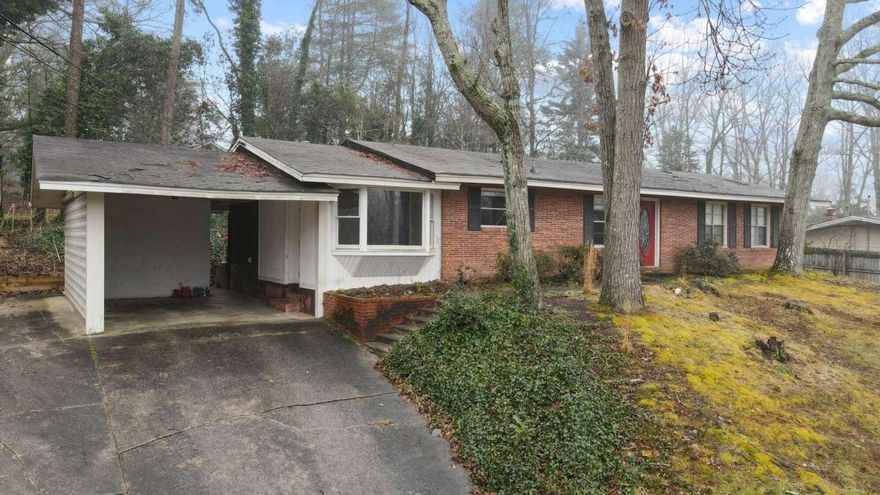 Embrace a cozy lifestyle in this 2 bedroom, 2 bathroom brick ranch just minutes to downtown Gainesville! The home features hardwood and tile floors throughout, fenced backyard, and carport.