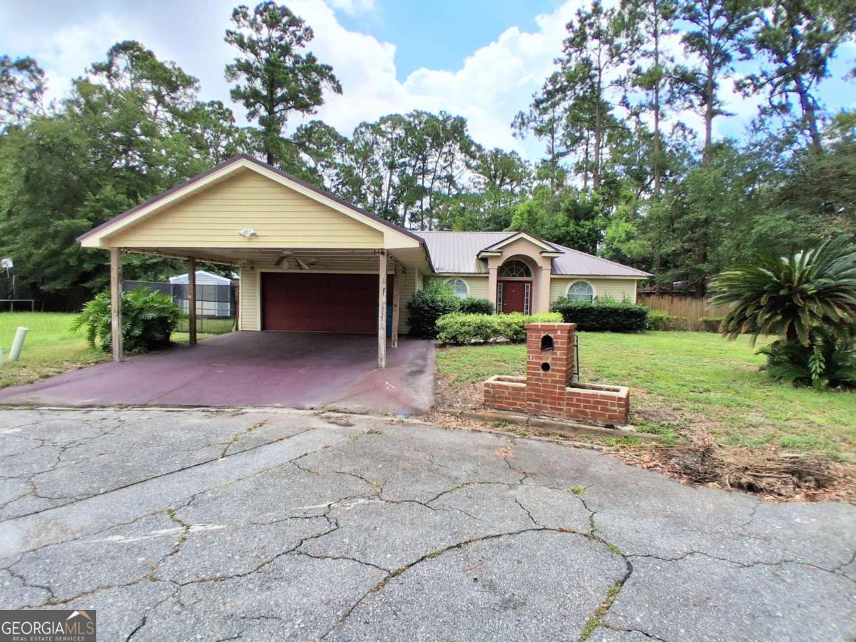 A fantastic home with plenty of space and potential! Situated on a quiet cul-de-sac, the property includes two outdoor storage sheds. The house features a split floorplan with a roomy primary bedroom. The primary bathroom boasts a walk-in tub, a separate shower, and a large closet. This home is ready for a buyer to make it their own. The water heater is brand new, the HVAC has been recently serviced, and the metal roof is about seven years old.