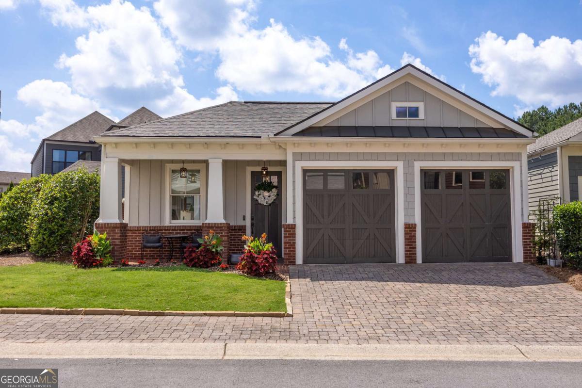 Upscale 3BR/2BA Home with Private Heated Pool - Lawn Care Included! Welcome to 307 Gray Shingle Lane - a beautifully upgraded 3-bedroom, 2-bath home offering 1,498 sq ft of luxury living in one of Woodstock's most desirable communities. This impeccably maintained property features high-end finishes throughout, including custom cabinetry, premium flooring, and designer lighting. Enjoy resort-style living in your private, heated pool complete with a tranquil waterfall feature, perfect for relaxing or entertaining. The backyard is fully mulched for a clean, low-maintenance look, and landlord-provided weed control ensures it stays that way. The professionally landscaped front and side yards are maintained by the HOA, giving you more time to enjoy the good life. Inside, the open-concept layout is bright and welcoming, with upscale touches around every corner. Highlights: 3 spacious bedrooms, 2 full baths Gourmet kitchen with upscale appliances and finishes Elegant primary suite with stepless walk in shower Private heated pool with waterfall Fully landscaped and maintained by HOA 2-car garage, smart thermostat, and more ?? Minutes to Downtown Woodstock, Lake Allatoona, shopping, dining, and I-575. Pet-friendly (with approval). Available 2 weeks from accepted application date. Don't miss this rare opportunity-schedule your showing today!