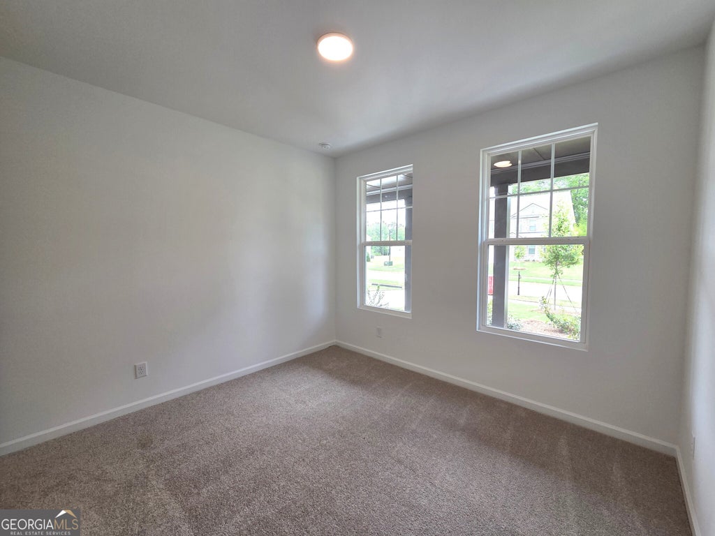 Photo of 7344 Tenton Crossing, Locust Grove, GA 30248 (MLS # 10870457)