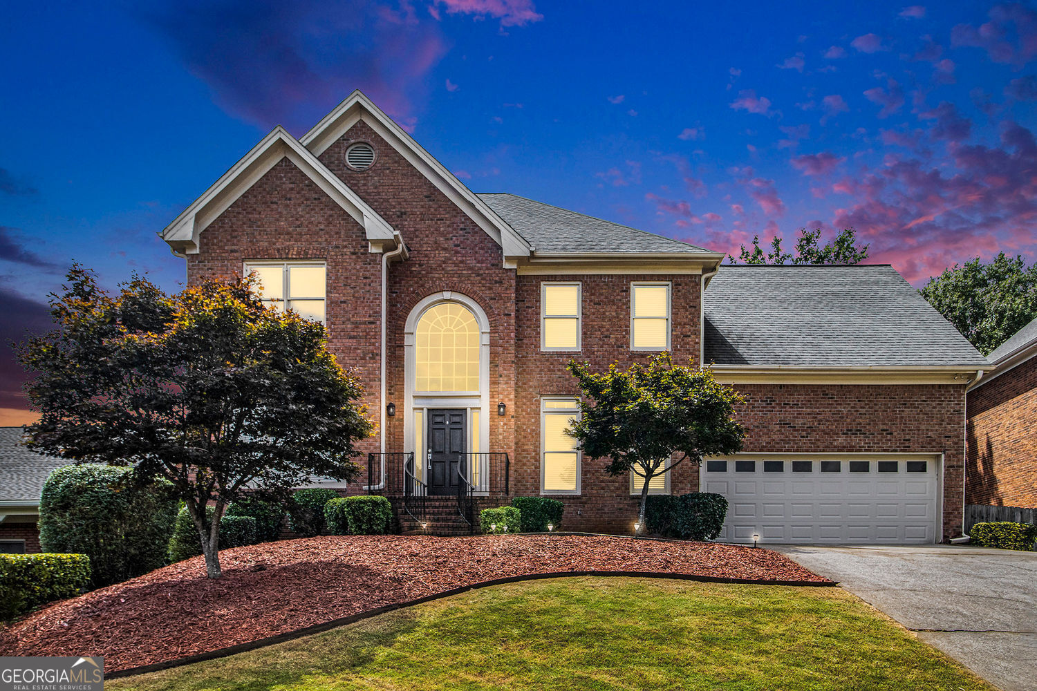 Welcome to this exquisite property located in Johns Creek, GA, ranked "#1 Best Place to Live" by U.S. News & World Report. This masterpiece embodies elegance and sophistication in every corner. As you approach, you are greeted by a stunning facade that combines architectural beauty with tasteful landscaping, inviting you to explore the wonders that lie within. The meticulously manicured gardens create a serene atmosphere, making this residence a peaceful retreat from the hustle and bustle of everyday life. Upon entering the grand foyer, you are immediately struck by the sense of spaciousness and light, with high ceilings and abundant natural light pouring in from large windows that frame the vista of the outdoors. The interior decor is characterized by a harmonious blend of contemporary design and classic touches, offering a warm and welcoming ambiance. The generously sized living room serves as the heart of the home, featuring an impressive fireplace that serves as a focal point, perfect for cozy evenings spent with family and friends. Adjacent to this space, the open-concept dining area provides an ideal setting for memorable gatherings, where laughter and conversation flow effortlessly. The gourmet kitchen is a chef's dream, equipped with state-of-the-art appliances and ample counter space that allows for culinary creativity. Sleek cabinetry elevates the functionality of this area while contributing to its modern aesthetic. Whether preparing a casual breakfast or hosting a lavish dinner party, this kitchen accommodates it all with ease. As you venture further into the home, you will discover multiple well-appointed bedrooms, each thoughtfully designed to provide privacy and tranquility. The master suite is a true sanctuary, boasting a luxurious ensuite bathroom complete with a soaking tub, dual vanities, and exquisite finishes. Each additional bedroom offers its own unique charm, providing comfortable and inviting spaces for guests or family members. Stepping outside, the backyard is an entertainer's paradise, featuring a spacious deck area ideal for cookouts and gatherings under the stars. The backyard is perfect for outdoor activities or simply enjoying the fresh air in your own private oasis. Additionally, this property offers convenient access to local amenities, ensuring that everything you need is within reach. Whether you are basking in the beauty of your surroundings at home or exploring the vibrant community nearby, this residence invites you to experience a lifestyle of comfort and sophistication. This stunning property is not just a house, but a place to call home.
