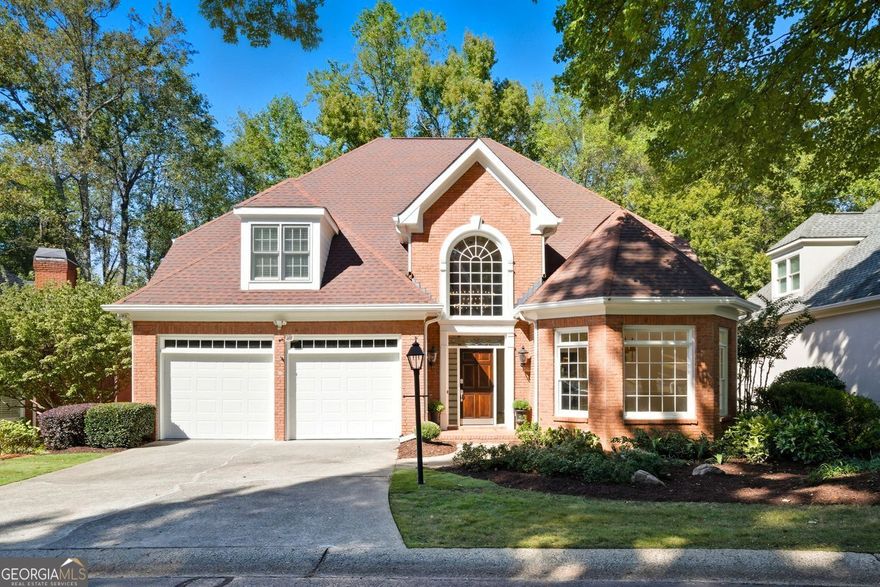 Welcome to 4573 Fountain Drive-where sophisticated design meets everyday comfort in the heart of East Cobb's top-ranked Walton High School District. Tucked within the boutique community of The Fountains of Woodlawn, this home offers the rare combination of dramatic architecture, indoor/outdoor living, and multi-generational flexibility. Step inside and be captivated by soaring ceilings, site-finished hardwood floors, and an open, sun-drenched layout designed for both entertaining and everyday ease. The chef's kitchen is a true centerpiece, featuring a granite island, premium stainless-steel appliances, and seamless flow into the fireside great room-the perfect space to gather and unwind. The grand main-level primary suite is a serene retreat with private access to the screened porch, ideal for morning coffee or evening wine. Upstairs, you'll find three spacious bedrooms and two full baths, all centered around a lofted hallway that overlooks the impressive two-story living space and lush backyard. Need room for a guest suite, teen hangout, home gym, or private office? The finished terrace level delivers, with an oversized flex room, an additional bedroom or office, a full bath, and tons of storage. Outside, enjoy your patio for hanging out! Just minutes from I-75, shopping, dining, parks, and East Cobb's best schools. ________________________________________