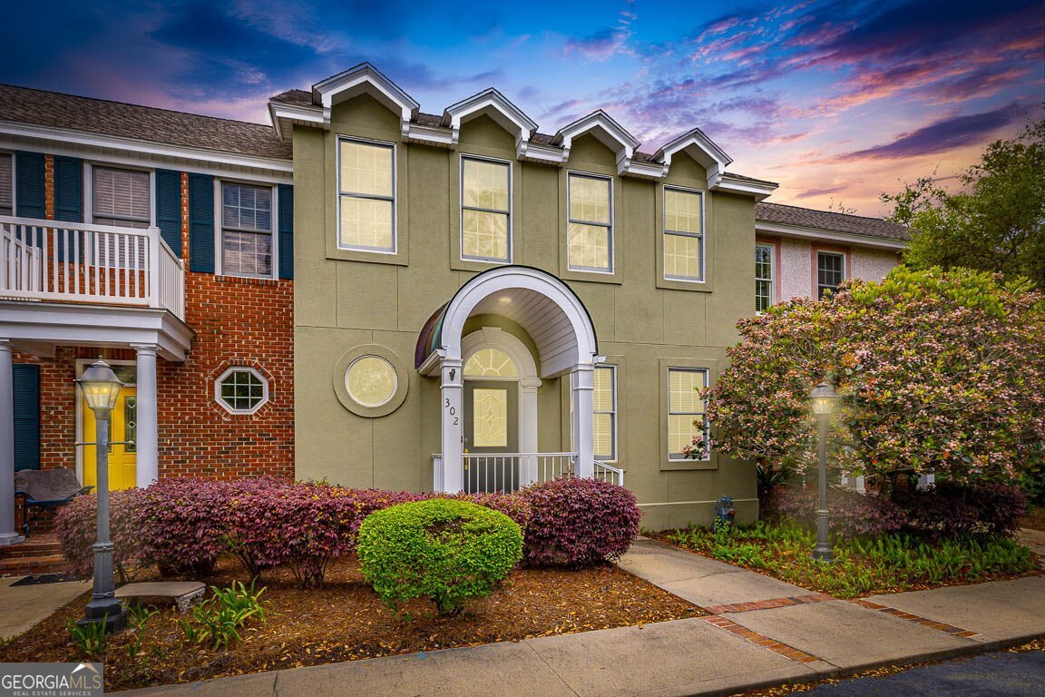 This pristine townhome is move-in ready in a quiet, gated community. The living area includes a gas log fireplace, dining space, and a flex room that could be a home office or sunroom. There is a lovely screened in porch to have your morning coffee. Both bedrooms have private baths and spacious walk in closets. The laundry room is conveniently located upstairs near the bedrooms. The property is not located in a flood zone, the association chose to have the buildings covered and this is included in the monthly association fee. If you are looking for low maintenance living, this is your spot! Very convenient to the causeway, restaurants, and shopping. No short term rentals in this community. **Can be sold furnished** Walk through video: https://youtu.be/D9Y7HNl_D_0
