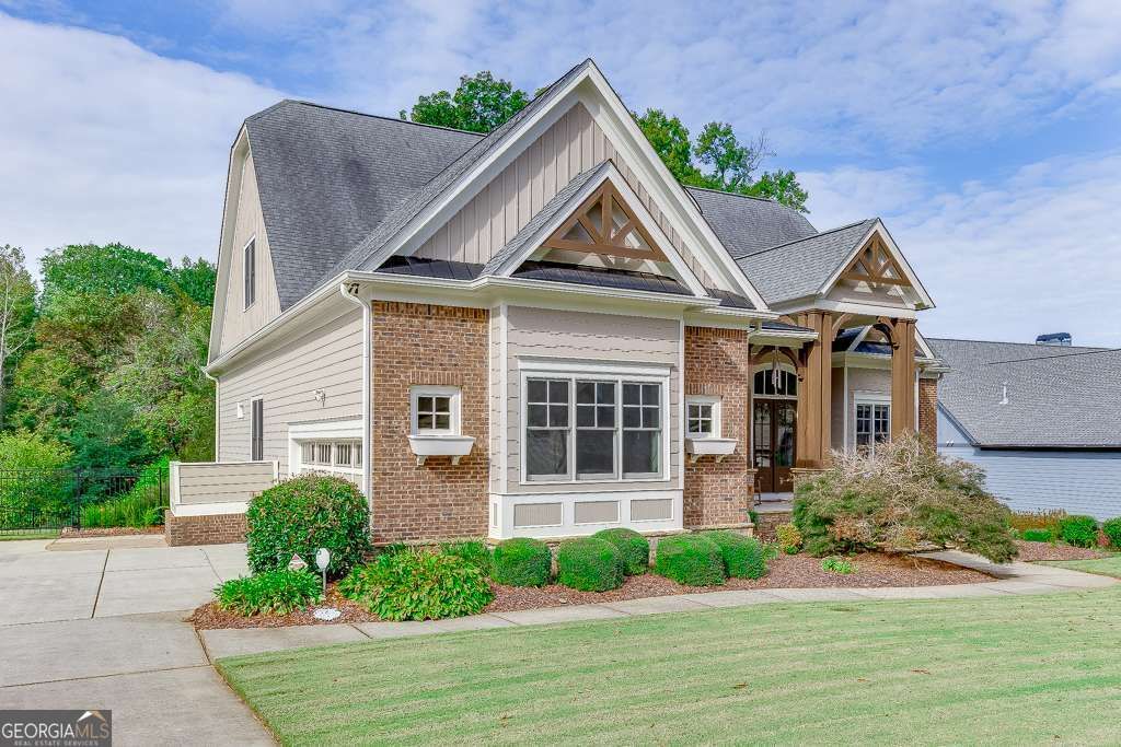 Photo of 411 Meadow Lake Terrace, Hoschton, GA 30548 (MLS # 10670875)