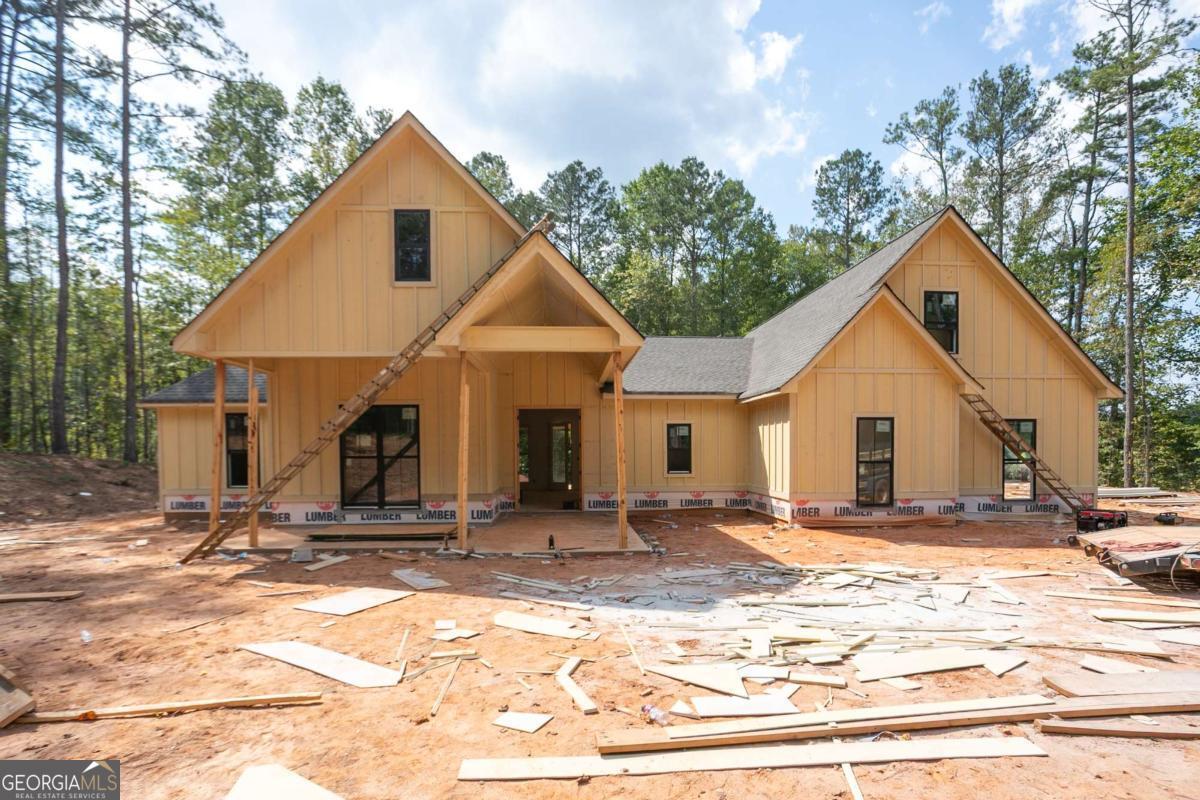 NEW CONSTRUCTION - ABSOLUTELY GORGEOUS - ELAM FLOORPLAN - NO HOA!- 10 ACRES - 5 BEDROOMS AND 3 1/2 BATHROOMS. THIS MASTERPIECE INCLUDES TRUE CRAFTSMANSHIP AND MODERN-DAY AMENITIES YOU DEMAND, The Luxurious Owner's suite features private access to cover patio, walk-in closet, dual vanities, separate large soaking tub and spacious tiled shower. Three additional large bedrooms on main floor to ensure that everyone jn your household has their own comfortable haven. Bonus Room and Full Bath Upstairs, Oversize Laundry Room by Master Suite. Gleaming Hardwood Floors throughout main living areas of the home. Gourmet Kitchen with Island includes Solid Surface Countertops, Huge Walk-in Pantry, Stainless Steel Appliances, Vent Hood. Separate Dining Room, Family Room with a relaxation view to the covered patio with fireplace. 24x24 Detached Garage/Workshop includes finished ceiling and walls 6 electrical outlets, 2 LED lights for ceiling, walk outdoor, gutters, garage door to match house.