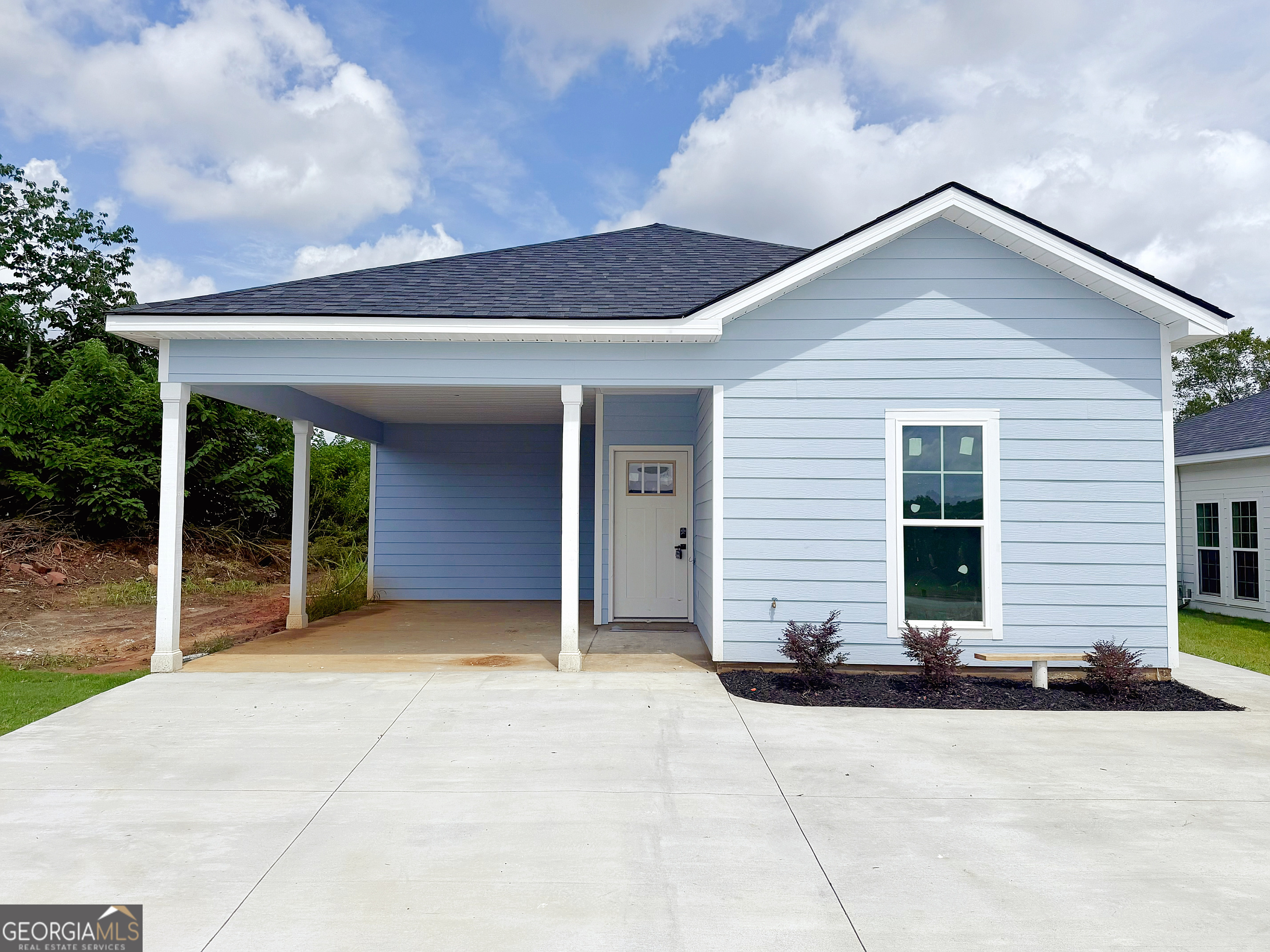NEW CONSTRUCTION: Almost complete and loaded with upgrades, this home at 1761 Old Savannah Rd can be yours with 100% financing and down payment assistance available! Featuring a smart split floor plan, 9' ceilings, modern fireplace, stainless steel appliances, and eat-in kitchen with bar-height counters. French doors open to your private outdoor space-perfect for relaxing or entertaining. Enjoy a separate utility room plus a primary suite with walk-in closet and spa-inspired tiled shower. Low-maintenance yard. Prime location in the historic, fast-growing Laney Walker District, just minutes to Downtown Augusta, the Medical District, Fort Gordon, shopping, and dining. Ready Fall 2025 - Schedule your tour now! (Stock photos; finishes may vary.)