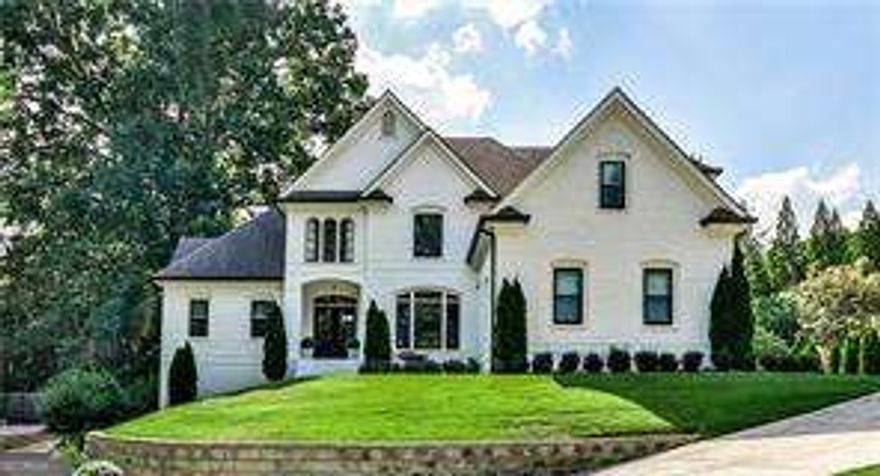Welcome home to this exquisite renovation in Sentinel Lake! The modern flair of this complete remodel will feel like new construction. As you pull up to the home you will love the curb appeal with the painted brick exterior and the professional landscaping. When walking through the new glass front double doors you will be welcomed by the open floor plan with views into the beautiful backyard and impressive chef's kitchen. Kitchen features a sizeable island with waterfall granite counters, sink, cabinetry and plenty of seating. High end appliances include six burner gas cooktop, built-in vent hood, pot filler, separate oven and convection built-in microwave. Coffee bar, panty and hidden laundry with sink. Two story fireside family room off the gourmet kitchen. Cozy den features a beautiful accordion door leading to the covered patio overlooking the private, flat backyard that is a perfect oasis for outdoor activities. Beautifully appointed primary suite is on the main level with double vanities, freestanding tub, separate shower and large closet with custom built-ins. Upstairs features three sizable secondary bedrooms each with their own ensuite baths. The beautifully finished basement blends cozy ambiance with stylish design, creating a welcoming space for entertaining or relaxing. The sleek bar is the perfect space to host parties or enjoy the game! Could also be used as an in-law suite with a bedroom, full bath with sauna/steam shower and laundry. No stone left unturned on this one! New hardwoods, windows/doors, HVAC and water heater. All new exterior paint, Hardi Plank siding, facia board, and gutters. This one is a treat to see!! Schedule your private showing today! Home was built in 1992 but completely rebuilt in 2021.