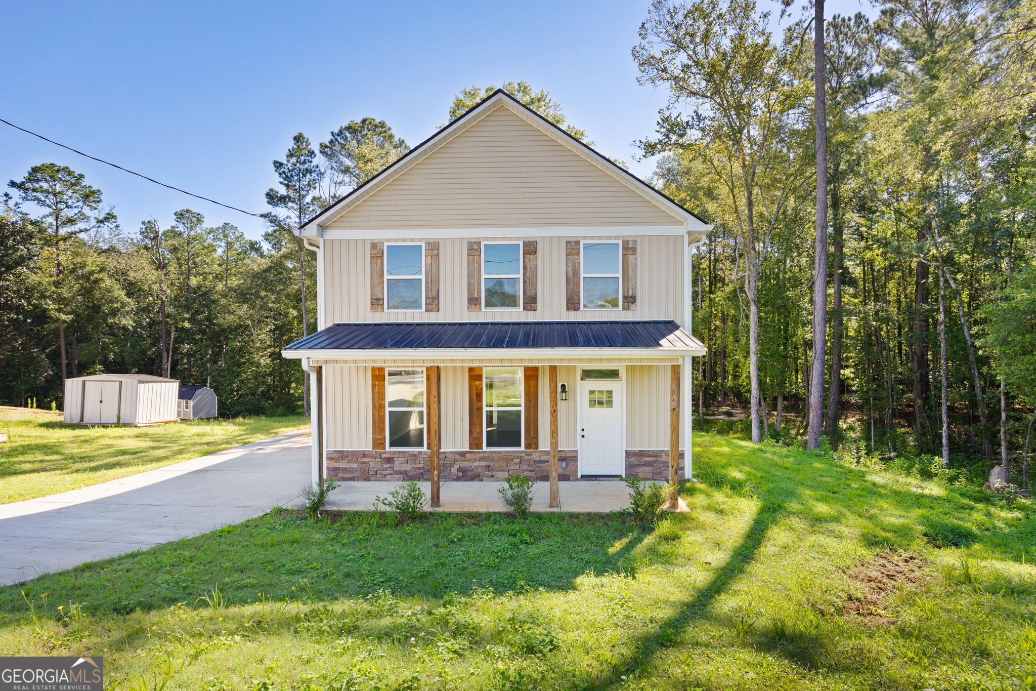 Step inside this Cedartown charmer - a 2022 build that still has that new house smell and all the modern touches you've been dreaming of! CEDARTOWN - BUILT 2022 - 3 BEDS - 2.5 BATHS - STEPLESS ENTRY - TWO-STORY - 1456 SQFT - 0.30 ACRES - TOTAL ELECTRIC - STAINLESS APPLIANCES - GRANITE COUNTERTOPS - LVP FLOORING THROUGHOUT - LARGE KITCHEN ISLAND - STYLISH BARN DOOR - DOUBLE VANITY PRIMARY ENSUITE - PUBLIC WATER & SEWER - NO HOA This two-story home offers 3 bedrooms, 2.5 bathrooms, and a stepless entry for easy access. As you walk in, you're greeted by an open-concept living space with gorgeous LVP flooring, neutral tones, and plenty of natural light. The living room flows seamlessly into the dining area and the kitchen, making it ideal for gatherings. The kitchen is a real highlight - stainless steel appliances, granite countertops, crisp white cabinetry, and a large island that's perfect for prep work, meals, or entertaining. Upstairs, you'll find three spacious bedrooms, including a double primary ensuite for added comfort and convenience. Each bath is finished with granite counters, modern fixtures, and a clean, timeless design. Step outside and enjoy a manageable 0.30-acre lot with public water and sewer - all with no HOA to worry about. Plus, this home is total electric, adding to the efficiency and ease of ownership. At 1,456 square feet, this home gives you the right amount of space without overwhelming upkeep - perfect for anyone looking for a modern, move-in-ready option in Cedartown. Don't let it get away! Make us an Offer today!