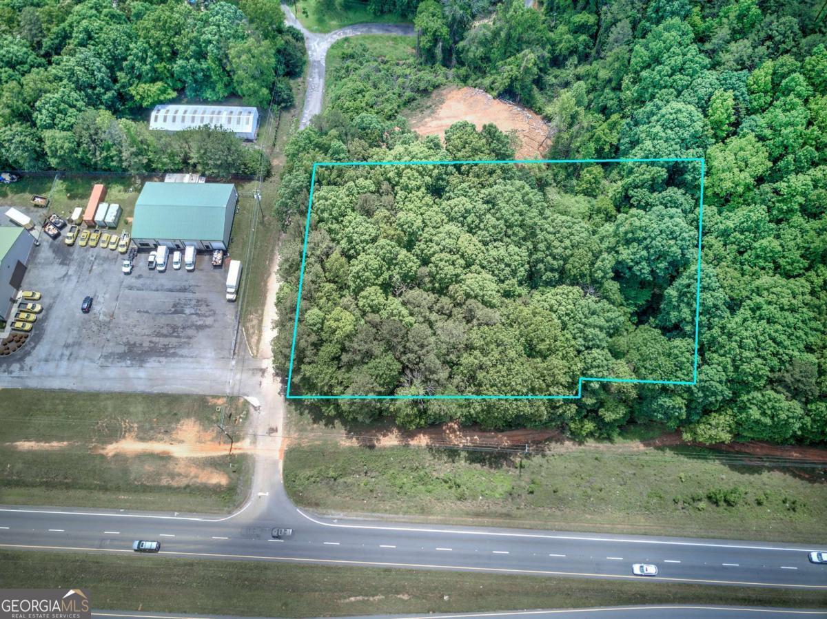 Discover a prime piece of real estate in Floyd County, Georgia, offering a 1.7-acre corner lot with 250 +- feet of road frontage on Hwy 411. Perfect for you to build your new dream home from a blank canvas. The land also has Potential for commercial use as well. This property is located only 15 minutes from the new Hyundai battery plant, one mile from East Rome Walmart and East Rome Bypass, and 12-15 miles from Highway 41. Don't miss out on this prime lot and location!