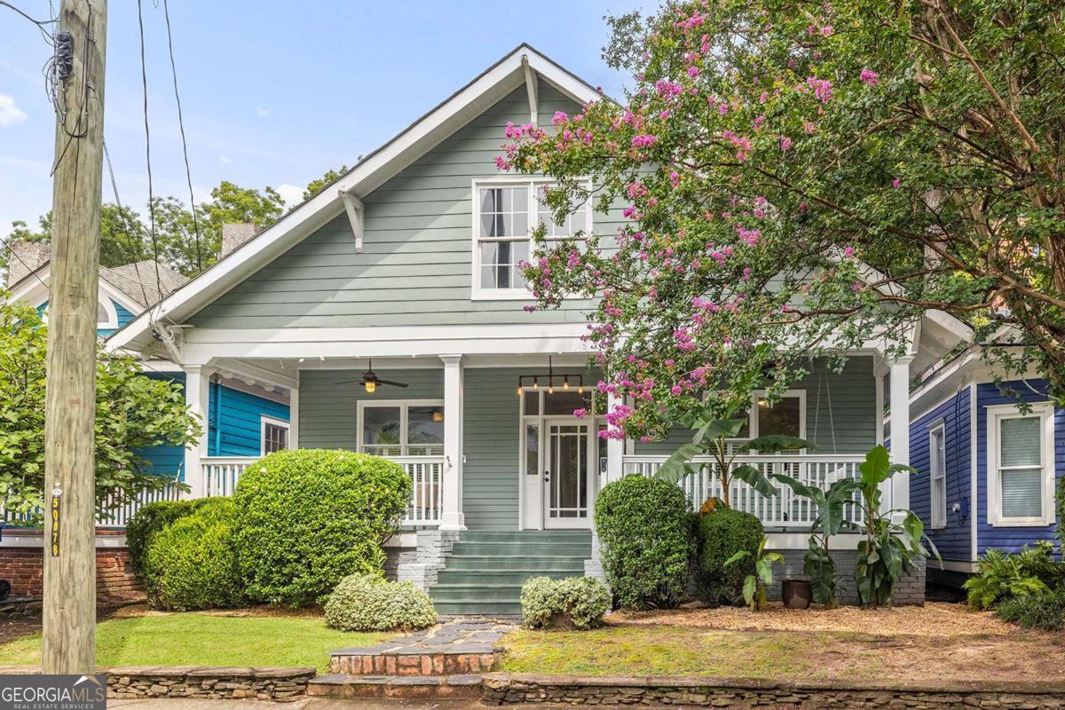 Your dream Candler Park bungalow has just hit the market. Step into this tastefully renovated 4-bedroom, 2.5-bathroom bungalow - where charm meets modern living from the moment you step onto the porch. Revel in the renovated primary suite (2021) and easy transitions from room to room thoughtful the home. Despite the updates, you will still find periodic elements such as three decorative fireplaces, a rocking chair front porch, recently sanded and stained hardwood floors, moldings throughout, and a long foyer entryway spanning nearly the length of the home. Maybe tall ceilings are your thing? 307 Josephine has those too. Outside, find joy in the hardscaped and turfed private backyard, whether hosting or simply relaxing around the gas fireplace. Sip your morning coffee on the front porch chatting with neighbors, as Josephine St is known for its sense of community. The icing on the cake is the location - situated in the heart of Intown Atlanta in Candler Park, walking distance to Little Five Points, Inman Park, the Atlanta BeltLine and so much more.