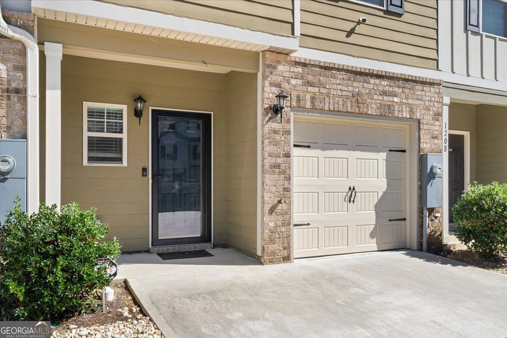 Photo of 1206 Creel Lane, Atlanta, GA 30349 (MLS # 10699707)