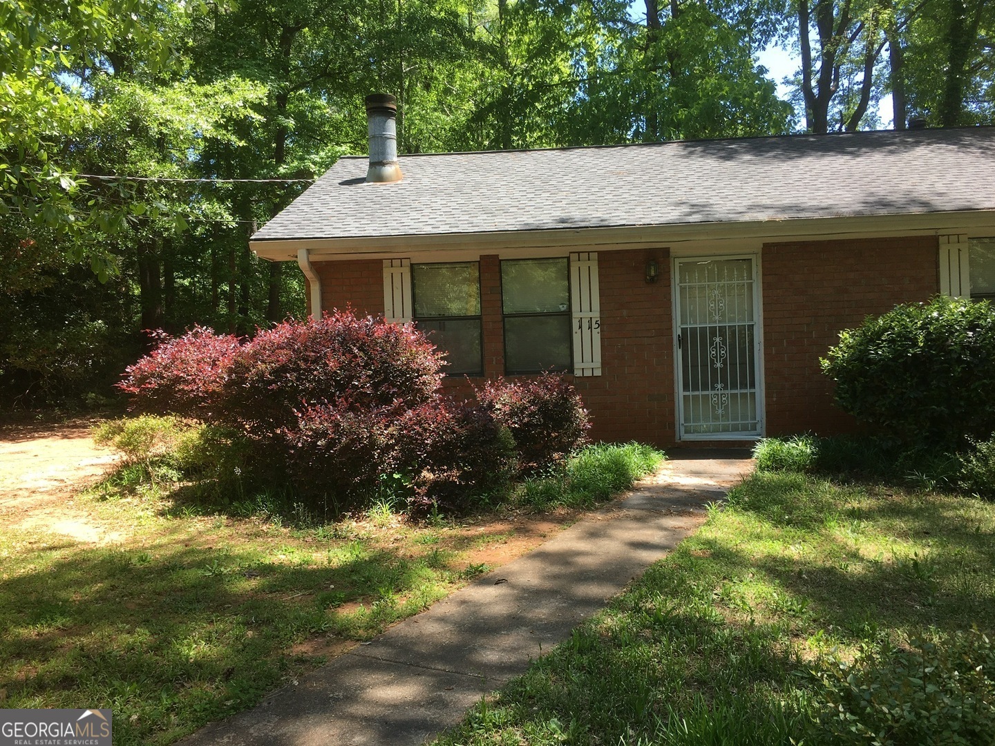 2 Bed/1 Bath duplex just off of Cedar Shoals Drive. Unit features a fireplace in the living room with a large window opening into the kitchen. Washer/dryer hookups located in kitchen. Refrigerator, electric range, and dishwasher included. No pets. Available December!