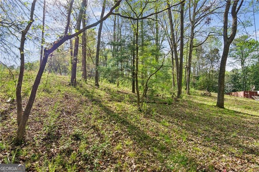 Fantastic opportunity on over 5 amazing acres that sit up off Hopewell Road. Build your custom estate lot featuring 1-3 homes, or build your true family compound. See the conceptual site plan which can be modified to your family or builder's specific needs. Land has been tested with level 3 soils without any issues. All perc tests and soil reports available upon request. Please call agent for additional site info. No access to existing home without bound contract.  Price increased to reflect development underway.