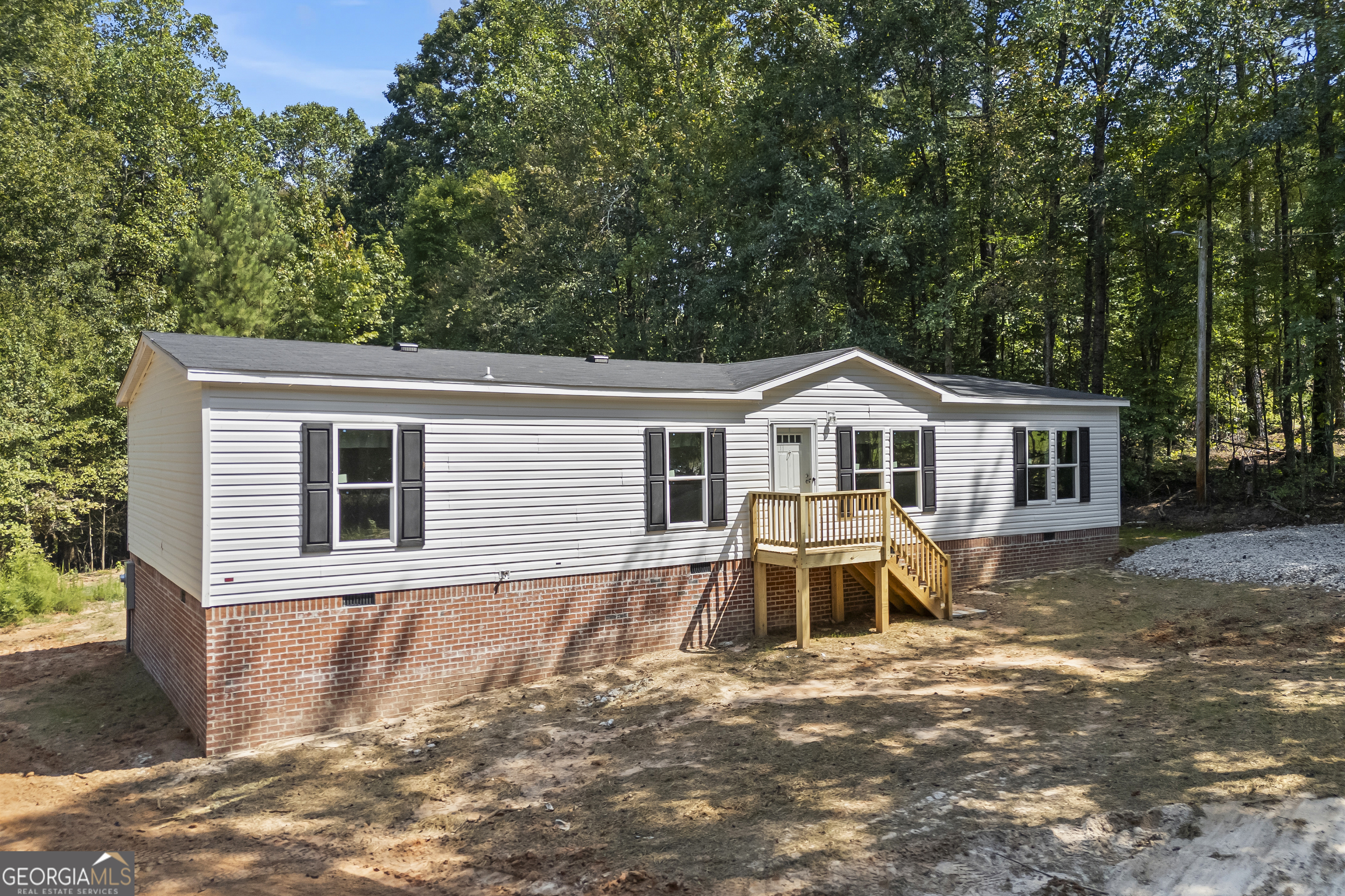 Welcome to your brand new 4-bedroom, 3-bathroom manufactured home in the heart of Lexington, GA! Sitting on a permanent foundation with 1,560 square feet of thoughtfully designed living space, this home combines modern style with everyday comfort. The open floorplan showcases a bright living area, a sleek kitchen with stainless steel appliances, and plenty of room to entertain or relax with family. The spacious owner's suite features a private bath and generous closet space, while three additional bedrooms provide flexibility for kids, guests, or a home office. This home is move-in ready and built to last, offering peace of mind and long-term value. Financing is made easy-USDA, FHA, VA, and Conventional loans are all welcome. Plus, when you use Ryan Liebowitz with Cross Country Mortgage, the seller is offering $1,500 towards your closing costs, making this an incredible opportunity to own a brand new home at an affordable price.