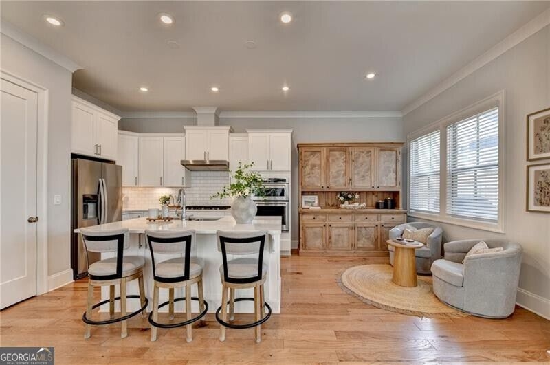 Photo of 4117 Stourbridge Common Circle, Milton, GA 30004 (MLS # 10856996)