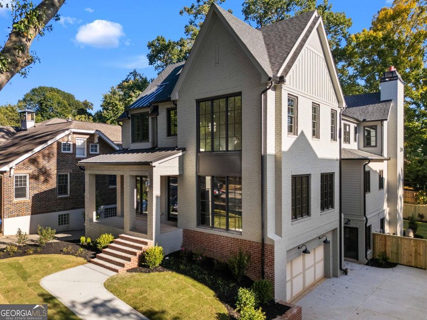 Strikingly beautiful new construction developed by Parkwood Living. Located on idyllic Sherwood Road, this home offers the best of everything with style, comfort and luxury just steps away from every amenity Midtown has to offer! Comprising  almost 5200 SF and flooded with natural light, there are multiple areas for leisure and entertainment indoors and out. Main floor features the formal living room with fireplace, dining room, discreet office or playroom, lovely powder room and a "show-stopper" Kitchen/family room adjoining the expansive covered terrace with fireplace overlooking the luxurious POOL and large, landscaped backyard. The 'state of the art' kitchen features a 48" SubZero side by side refrigerator, 48" WOLF Gas range, and Microwave Drawer, plus service 'prep' area with additional cabinetry, secondary sink, SubZero Beverage Fridge and walk-in pantry. Cabinetry is White oak Shaker style along with accent cabinets painted with the popular SW 'Black Fox'. Oversized kitchen island is topped with quartzite with waterfall edge, seats 5-6 and adjoins both the fireside family room and roomy breakfast area. Upstairs level boasts 4 ensuite bedrooms including the STUNNING primary suite featuring a cathedral ceiling, fireplace, large custom-finished walk-in closet and covered balcony/porch overlooking the gorgeous backyard. The spa-like bathroom has a large double shower with 6 shower heads, separate soaking tub and water closet.  The secondary bedrooms all have vaulted ceilings and tastefully finished bathrooms. The laundry room includes 2 sets of stackable Washer/Dryer units, generous cabinetry and sink. Terrace level is simply remarkable. Large, sunny  rec-room is centered on the stylish wet bar with extensive storage/cabinetry, 2 separate Drop Zones at garage access and pool terrace access, full bathroom located between the guest bedroom and pool terrace. Covered outdoor kitchen features a upscale grill and vent hood, sink, beverage fridge, prep counter and storage. This ultimate entertaining area includes the 5th fireplace opposite the kitchenette.   Additional features...   Direct line to the upcoming entrance to the planned Piedmont Park expansion, Oversized garage can accommodate 3 cars(2 tandem),  selected oversized plantings for landscaping, seasonal skyline views. Shopping, restaurants, parks and entertainment are all within walking distance. Quick access to Midtown/Downtown/Buckhead, Morningside and Virginia Highland entertainment districts. This is the ultimate sweet spot with Goodness in every direction!