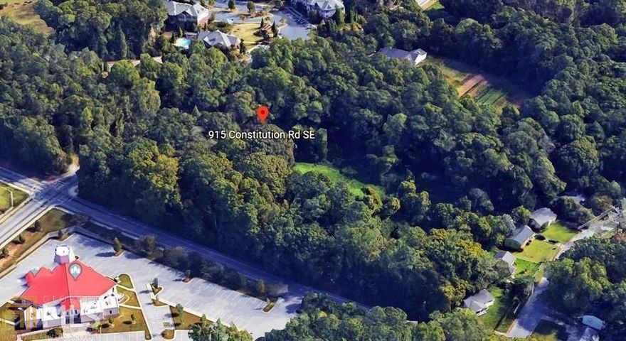 Amazing opportunity in City of Atlanta! This parcel of undeveloped land is located at the southeast corner of the intersection of Constitution Road & Forrest Park Rd. The 3.5+/- acreage sits fronting approximately 378' on the south side of Constitution Road and 436' on the east side of Forrest Park Road. Re-zoned to RG3-C for 52 townhomes.