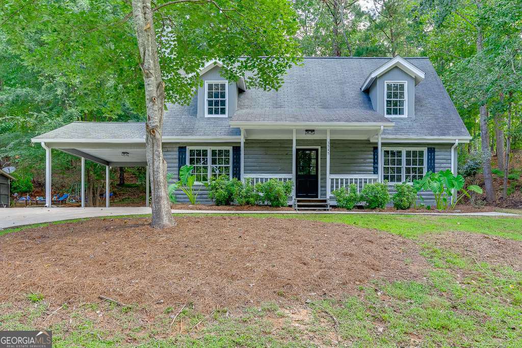 Welcome to your dream home - a beautifully updated 3-bedroom, 2.5-bath property located just steps from the lake, offering stunning lake views from the front porch. Whether you're relaxing outdoors or enjoying the view from inside, this home delivers peaceful, scenic living every day. Inside, you'll find a fully refreshed interior featuring brand-new flooring, all-new light fixtures, modern countertops, a stylish tile backsplash, and fresh paint throughout. The kitchen shines with new stainless steel appliances, perfect for both everyday cooking and entertaining. The open and inviting layout provides the perfect balance of comfort and style, with spacious bedrooms and updated bathrooms that feel fresh and luxurious. Situated in a prime location across from the lake, this home combines convenience, charm, and breathtaking surroundings. Homes like this don't come around often - and they don't stay on the market for long. Don't miss your chance to own this move-in-ready lakeview gem. Schedule your showing today!
