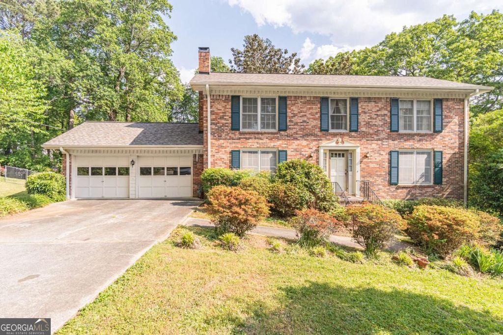 Photo of 4582 Ridgeland Drive SW, Lilburn, GA 30047 (MLS # 10741186)