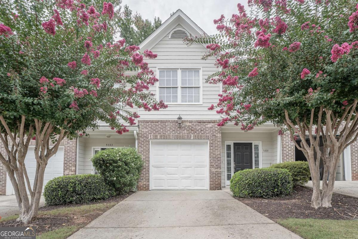 Upgraded & Move-in Ready! Welcome to this beautifully renovated home nestled between Norcross and Lilburn, in a quiet gated community. Featuring 3 bedrooms and 2.5 bathrooms, this home has been thoughtfully updated with fresh paint (inside & out), brand-new appliances, upgraded lighting, new carpet, and modern finishes throughout. The kitchen boasts freshly painted cabinets, stylish new fixtures, and all-new appliances, making it the perfect space for cooking and entertaining. Upstairs, the spacious primary suite offers soaring ceilings, a double vanity, soaking tub, separate shower, and private water closet. The laundry closet is conveniently located in the hallway near all bedrooms. With easy access to I-85, shopping, dining, and entertainment, this home blends comfort, convenience, and modern upgrades-ready for its new owners!