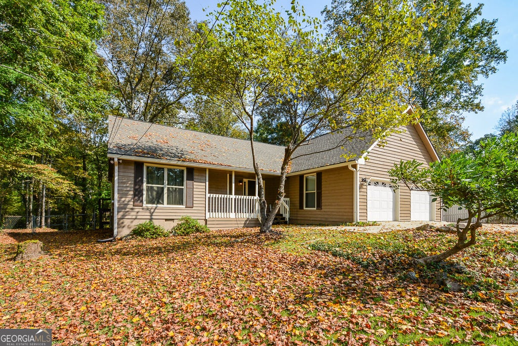 Photo of 5256 Olde Mill Drive NE, Woodstock, GA 30188 (MLS # 10874018)