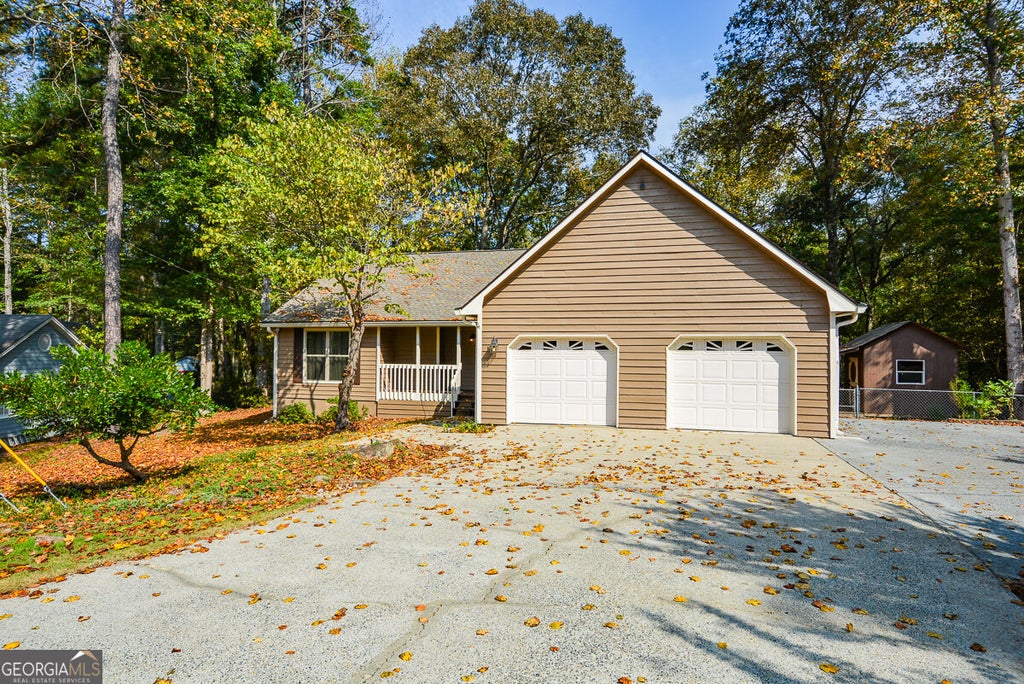 Photo of 5256 Olde Mill Drive NE, Woodstock, GA 30188 (MLS # 10874018)