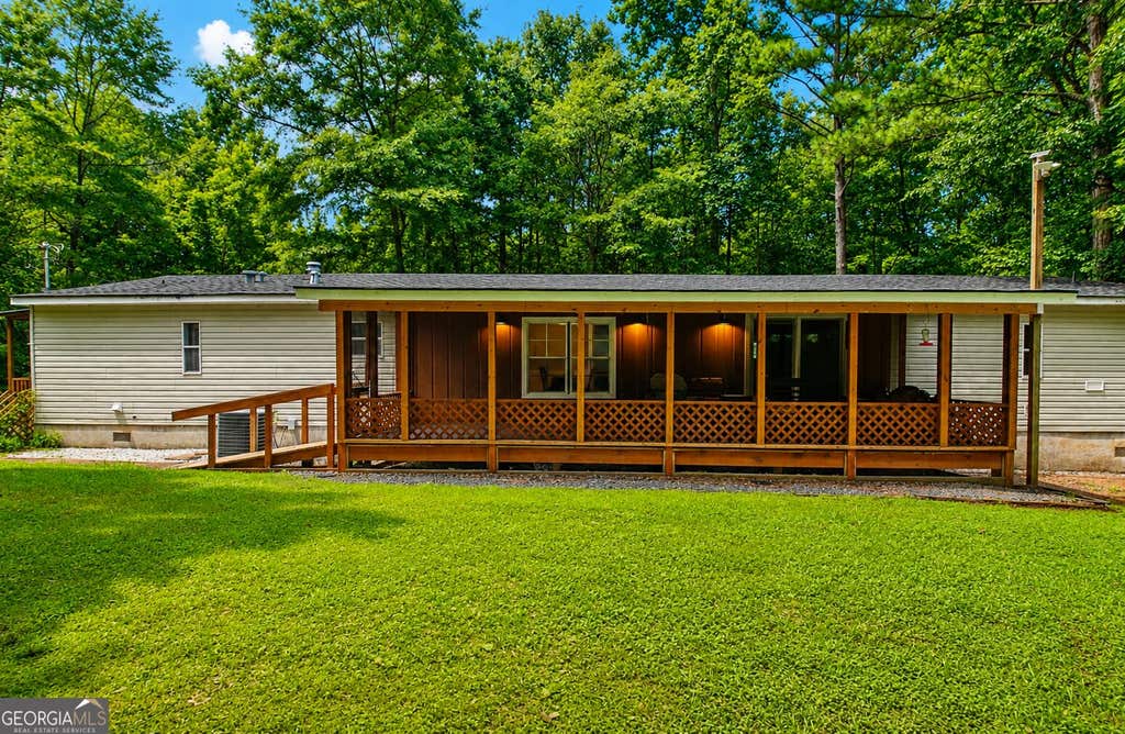 Photo of 8622 Whitehouse Parkway, Woodbury, GA 30293 (MLS # 10822077)
