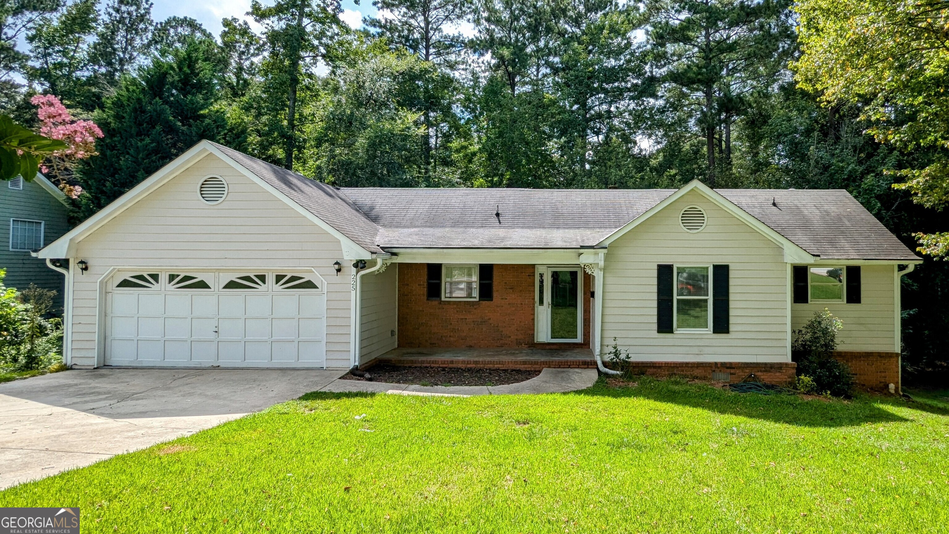 This charming 3-bedroom, 2-bath ranch offers comfortable single-level living with thoughtful features throughout. The spacious living room boasts a cozy brick fireplace and plenty of natural light, while the kitchen provides ample cabinet space and an adjoining breakfast area. The primary suite features a tray ceiling, double vanity, separate tub and shower, and a walk-in closet. A dedicated laundry room adds convenience to daily routines. Step outside to a large back deck and screened porch, perfect for relaxing or entertaining, all overlooking a private, wooded backyard. Complete with a two-car garage, this home is ready to welcome its next owner.**Agents: Please read private remarks/look at the offer guidelines in docs before calling, it should answer all questions you have.**