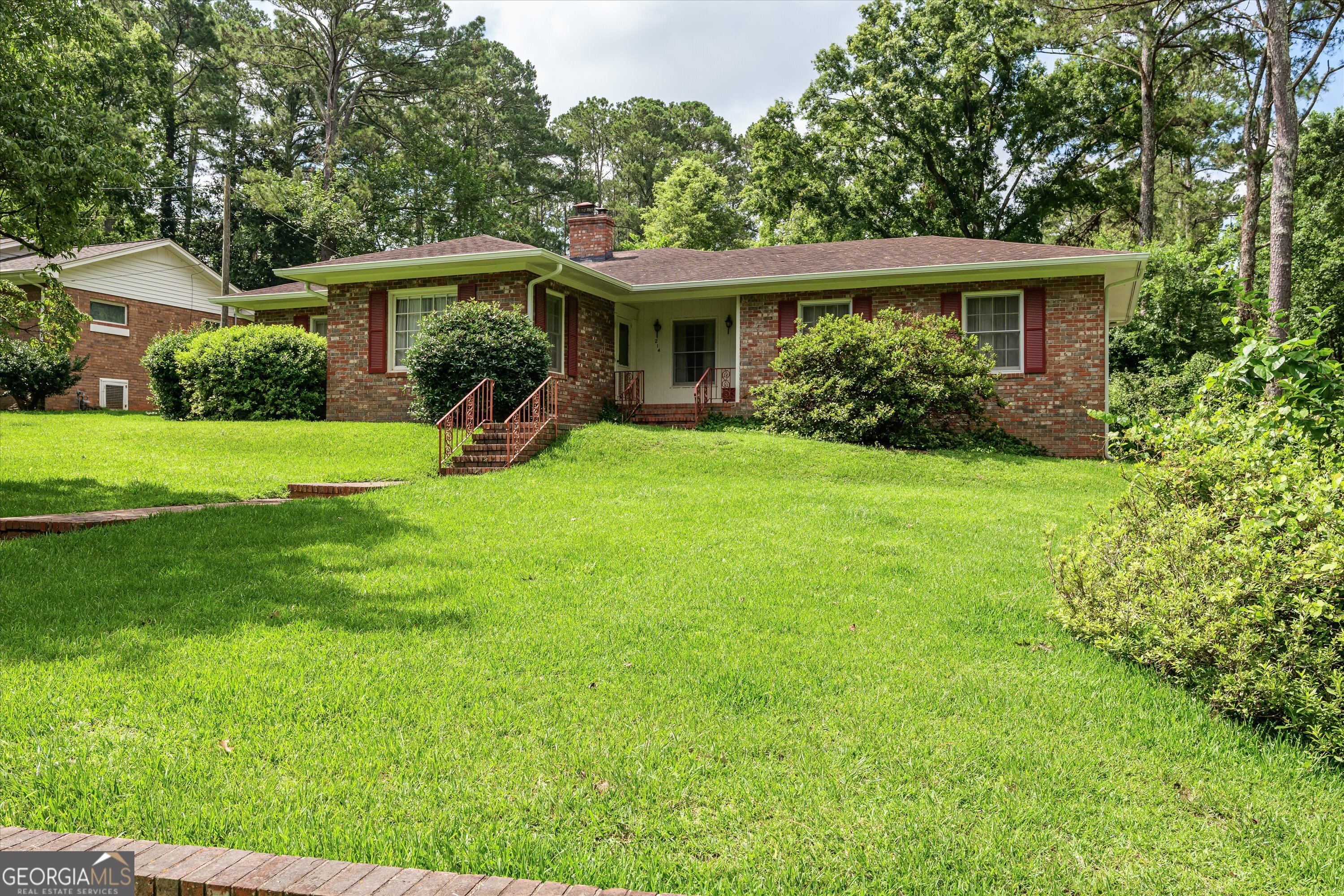 This charming all-brick ranch in beautiful Washington, GA offers the perfect blend of character and modern comfort with 2 spacious bedrooms and 2 full bathrooms. Step inside to an updated kitchen with stylish finishes, ideal for cooking and entertaining. A sun-filled attached greenhouse adds a unique touch-perfect for gardening, relaxing, or year-round greenery. The home also features newly installed gutters, tall-ceilinged garage with great storage or workshop potential, and is situated in a quiet, well-kept neighborhood that feels both peaceful and welcoming. A rare find with timeless appeal and thoughtful updates throughout.