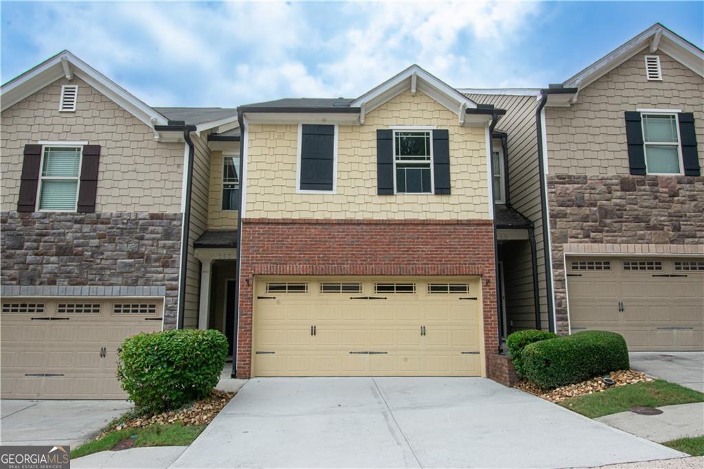 Charming Townhouse in Prime Woodstock Location! Welcome home to this beautiful townhouse ideally located just minutes from vibrant Downtown Woodstock, with easy access to top shopping, dining, and major highways. Nestled in a safe, well-maintained community featuring a swimming pool and professionally landscaped common areas maintained by the HOA. Enjoy peace of mind in a top-ranked school district, making it perfect for families. Don't miss this rare opportunity to live in one of Woodstock's most desirable neighborhoods!