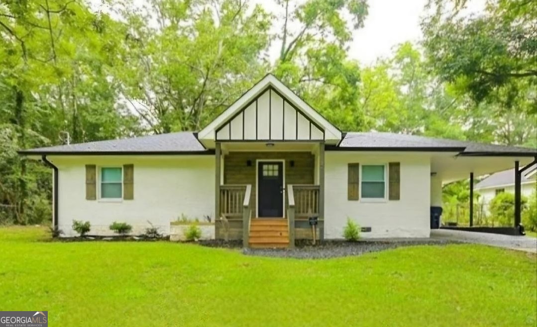 **Step into a beautifully renovated move-in ready dream home, also great for a savvy investor** Currently being rented as an Air BNB most weekends. This charming residence boasts stunning hardwood look laminate floors throughout, creating a warm and inviting atmosphere. The chef's dream kitchen features sleek white shaker cabinetry, gleaming granite countertops, a stylish hexagonal backsplash, and top-of-the-line stainless steel appliances. Imagine hosting unforgettable gatherings in the spacious living areas, perfect for both entertaining and relaxing. Each bathroom has been meticulously updated with elegant granite counters, custom vanities, and exquisite tile shower surrounds. Designer lighting fixtures add a touch of sophistication throughout the home. **Enjoy the peace of mind that comes with a new underground sewer line** and relax in the expansive backyard with its inviting patio, perfect for outdoor activities and gatherings. This property boasts a fantastic location, just moments from the vibrant downtown scene, the lively Lakewood Amphitheater and only 7 miles to the airport! Newer homes built in the surrounding area. *Potential Short Sale* *All offers must be approved by sellers lender.* Please use Showingtime for Showings. Owner holds a Georgia Real Estate license but is not the listing agent.