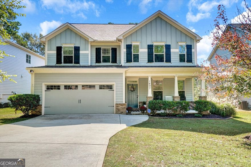 Welcome home to 1697 Dyeson Road in Marietta; a beautifully maintained 4-bedroom, 2.5-bath home built in 2016 that perfectly blends modern comfort with timeless style. The inviting floor plan features a spacious family room with a cozy fireplace and open views to the kitchen, where you'll find crisp white cabinetry, granite countertops, stainless steel appliances, a walk-in pantry, and a large center island ideal for gathering and meal prep. A separate dining room showcases charming board-and-batten detailing, adding character and warmth to the main level. Upstairs, all four bedrooms offer generous space, including a serene primary suite with an oversized walk-in closet featuring upgraded organizers, dual vanities, a soaking tub, and a separate shower. Step outside to enjoy the expansive, flat, fenced-in backyard   complete with an extended concrete patio, newly planted trees, and plenty of room for play or entertaining. Thoughtful updates include a new HVAC system (May 2024), upgraded light fixtures and ceiling fans, fresh interior paint in most rooms, and added backyard fencing for privacy. Located near parks, schools, and all the conveniences of Marietta living, this move-in ready home offers style, comfort, and value in one exceptional package.