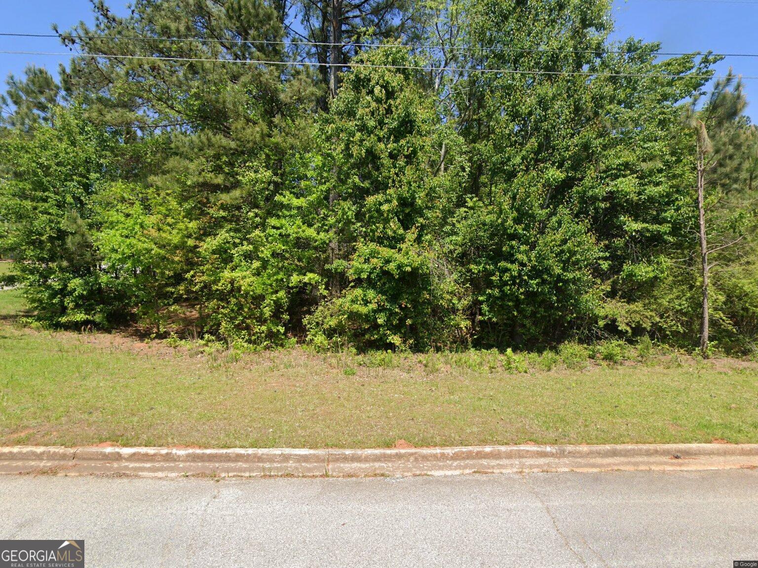 Build your dream home on this beautiful 0.41-acre lot in the desirable St. Andrews Country Club Estates community of Winston, GA. Tucked away on a quiet cul-de-sac, this spacious parcel offers the perfect blend of privacy and convenience, making it ideal for a custom build. Ample space, you have the flexibility to design a home that fits your lifestyle whether you envision a charming single-family home or an elegant estate with outdoor living areas. Located in Douglas County, this neighborhood provides a peaceful, upscale atmosphere while keeping you close to shopping, dining, schools, and easy access to I-20 for commuting. Don't miss the chance to secure one of the few remaining build-ready lots in this sought-after community.