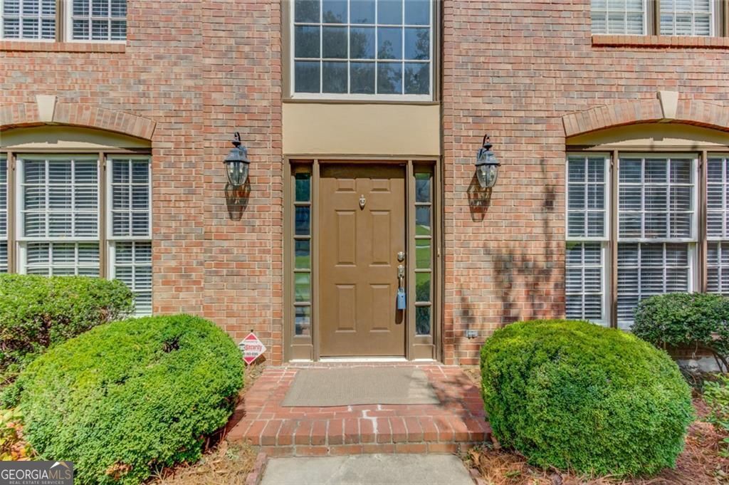 Photo of 7280 Devonhall Way, Johns Creek, GA 30097 (MLS # 10768305)