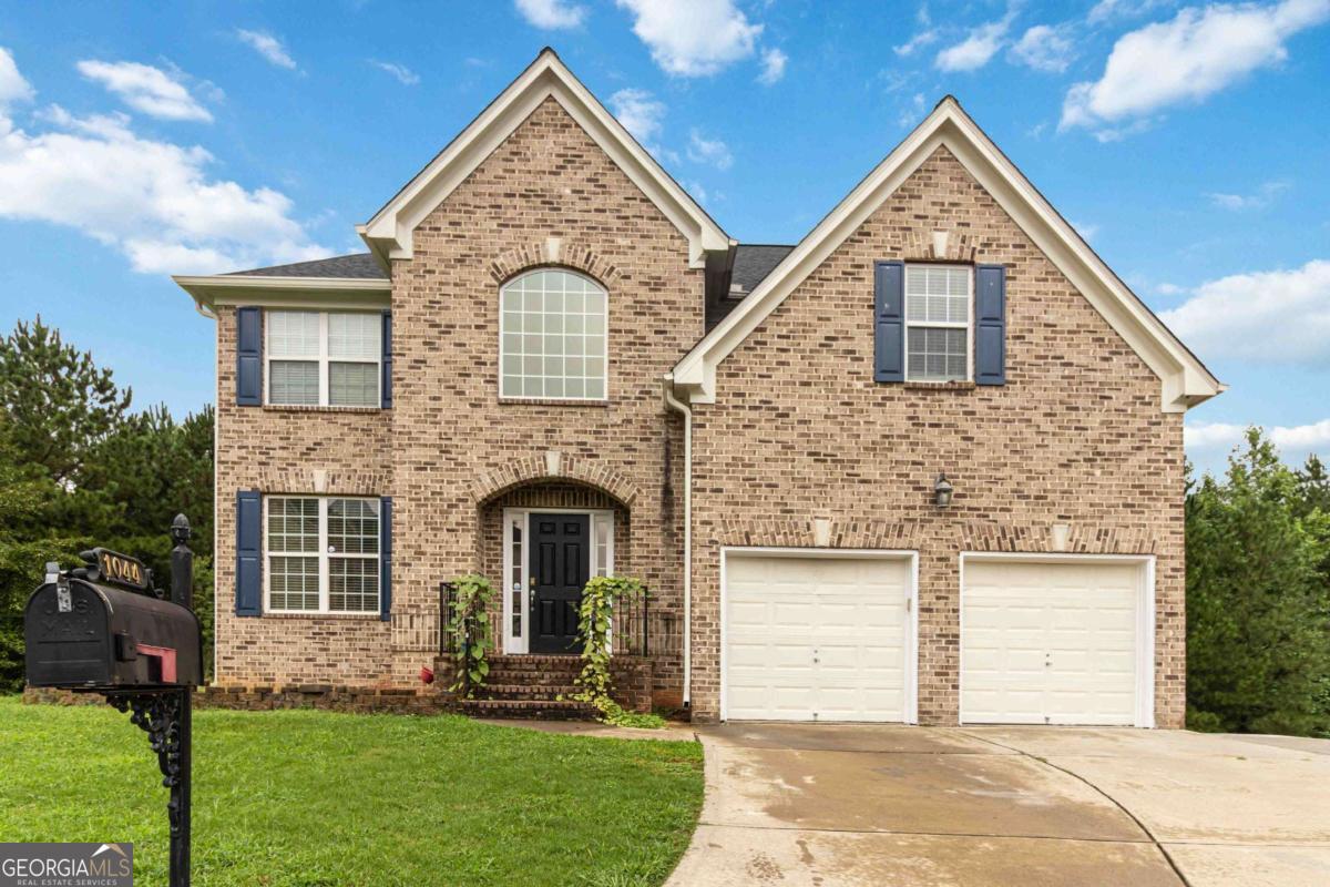 Beautiful home in the heart of Lawrenceville! tucked into a quiet cul-de-sac, this spacious and well-maintained home offers comfort, space, and convenience. Located in the desirable Ridgeview neighborhood, it's also close to shopping, dining, and local restaurants, making everyday living incredibly convenient. Step into a welcoming foyer that opens to a spacious family room and a large, open kitchen with plenty of room for cooking and gathering. The kitchen flows into a separate dining room, perfect for family meals or entertaining guests, and a private living room for more quiet, comfortable moments. From the kitchen, step out onto a spacious deck, ideal for barbecues, gatherings, or relaxing evenings outdoors. Upstairs, a beautiful staircase leads to a generous master suite with a luxurious bathroom and oversized walk-in closet. You'll also find three additional bedrooms, a full bathroom, and a spacious laundry room. The owner has made valuable upgrades, including finishing the basement adding a separate HVAC system, and adding a private exterior entrance with newly poured concrete stairs and patio, ideal for an in-law suite or potential rental unit. The basement is functional and ready, with room for the buyer's final personal touches. Located in a community that offers a clubhouse, pool, and tennis court, this neighborhood is perfect for families and provides plenty of activities for kids and residents alike.