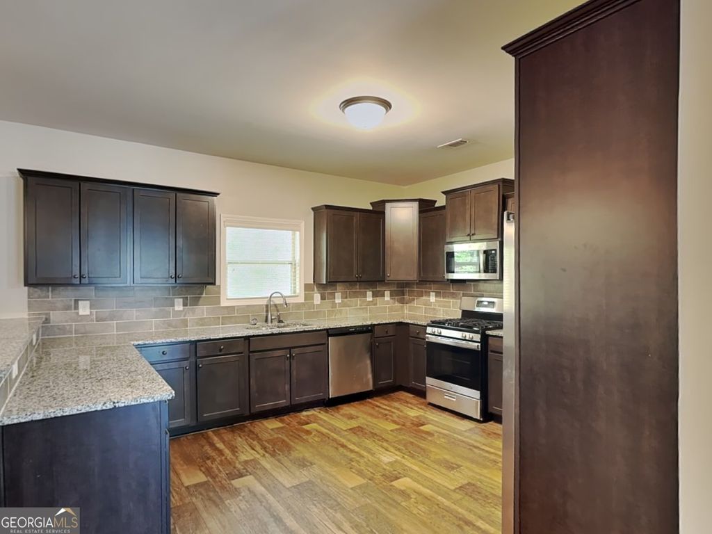 Photo of 483 Cherry Creek Drive, Loganville, GA 30052 (MLS # 10736219)