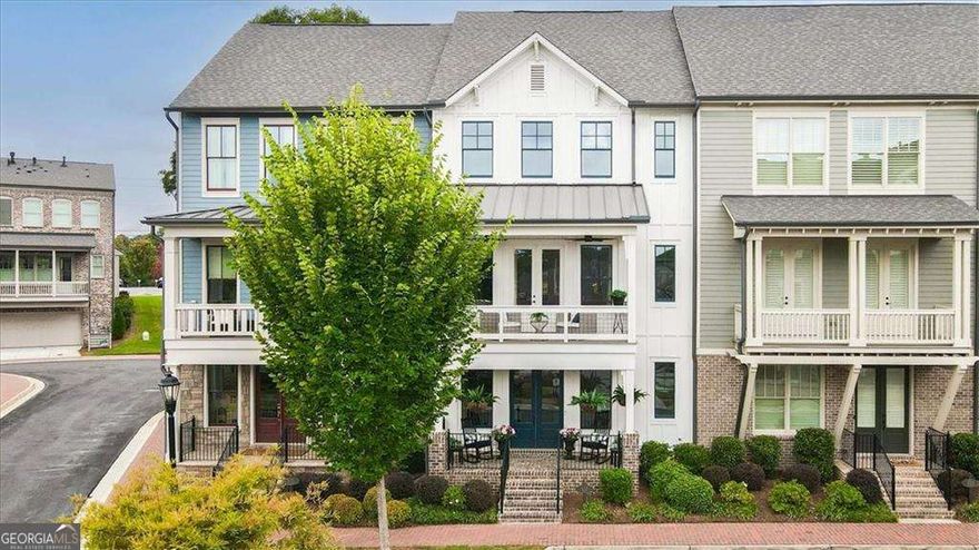 If location and better than new tops your list, Canopy is as good as it gets - a boutique community perfectly tucked between Roswell Mill, Canton Street, and the Chattahoochee River. Surrounded by parks, trails, and local hotspots, this model home stands out with double front porches, designer finishes, and luxury upgrades throughout. Step through the double front doors into a light-filled open plan with hardwood floors, custom lighting, and so many upgrades throughout. The gourmet kitchen boasts quartz countertops, abundant cabinetry, and top-tier stainless appliances, flowing seamlessly into the spacious dining and living areas with fireplace and shiplap accents. Enjoy indoor-outdoor living at its best with a front balcony overlooking the community and a covered back deck with privacy curtains. The corner office with windows-an inspiring work-from-home retreat. Upstairs, the primary suite features a large walk-in closet and a spa-inspired bath with double vanities and an oversized shower. Two generous secondary bedrooms provide comfortable space for guests.  The laundry has also been upgraded with extra cabinets, quartz countertops and sink.   The terrace level is bright and inviting, finished to the same high standards as the main level and complete with a full bath-perfect for a media room, gym, or guest suite. Community perks include a dog park and an overlook park with river views. From here, you can walk to Gate City Brewing, Mac McGee's, and all the charm of Historic Downtown Roswell. Experience upscale living with a lock-and-leave ease, where every detail blends comfort, convenience, and style.  Canopy isn't just a neighborhood - it's a lifestyle.