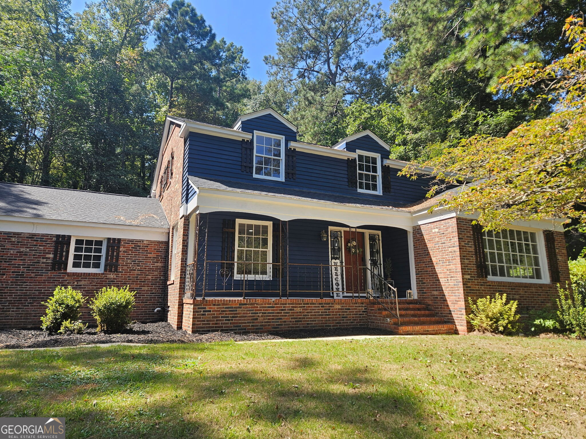 Step into this spacious 5-bedroom, 3-bath home that blends timeless character with plenty of living space. Featuring original hardwood floors, vintage tile, and a cozy fireplace, this home offers the perfect balance of warmth and elegance. With its classic design and thoughtful layout, it's a rare find that brings charm, comfort, and functionality together.