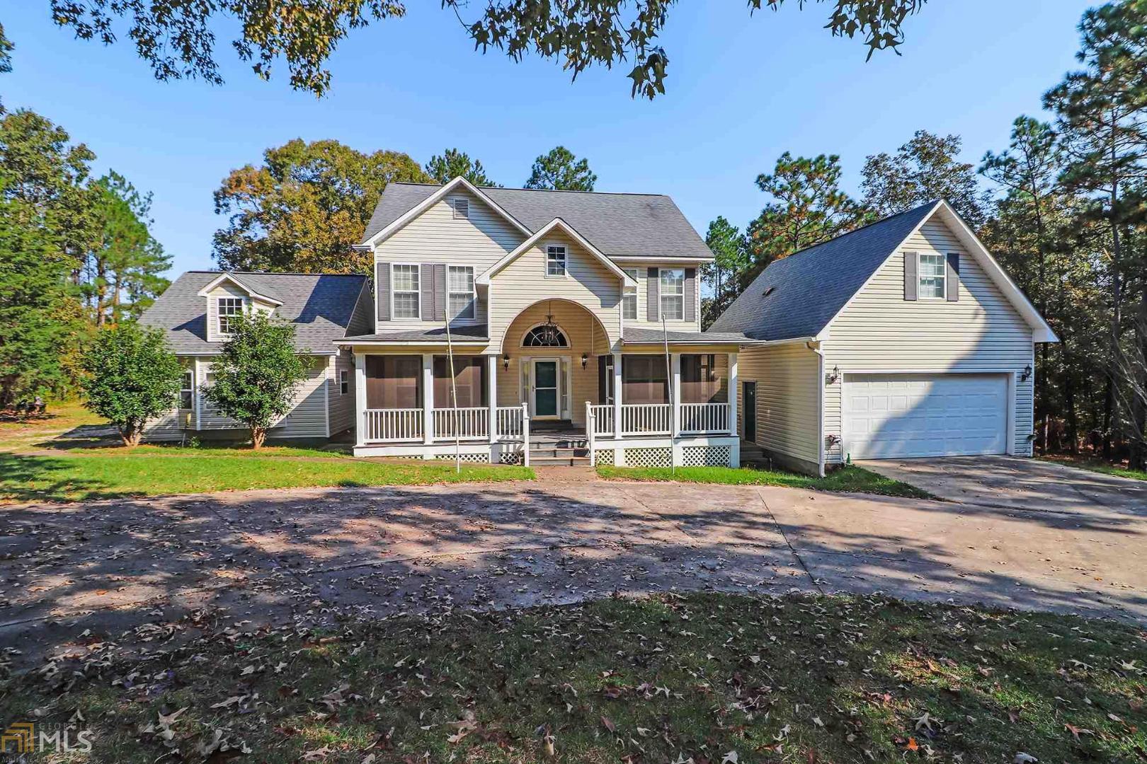 Enjoy country living in this spacious home located on two acres. 4 bedrooms and a bonus room set up as a secondary kitchen. 2 Car Garage with a half bath and bonus room above. Circular driveway with extra parking. If you like privacy this home is perfect. Large shelter out back with power and plenty of room to roam.