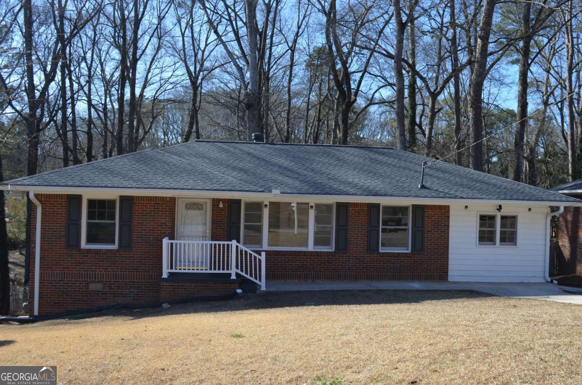 This charming 3-bedroom, 2-bath, 4-sided brick ranch in Southeast Atlanta is the perfect blend of classic character and modern updates. Inside, you'll find stylish new light fixtures, updated faucets, and a beautifully renovated en suite bathroom with a sliding barn door for added flair and privacy. The kitchen shines with stainless steel appliances and a clean, modern design ideal for everyday living. Recent upgrades also include a new roof, gutters, and front door-giving you peace of mind for the future. A spacious living room offers great entertaining potential, and the private-entry basement is a blank canvas ready to become a studio, in-law suite, or home office. Conveniently located near downtown, parks, shopping, and just 3 minutes from Browns Mill Golf Course, this home puts everything within easy reach. Add income potential or extra space with the basement-smart move for any homeowner! Take advantage of incredible down payment assistance-up to $45,000 for first-time AND repeat buyers, plus seller concessions!