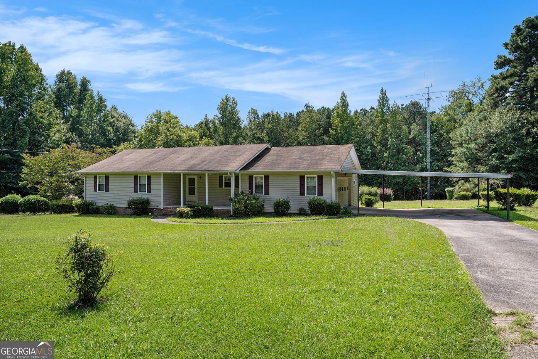Charming 3-bedroom, 2-bath ranch situated on almost an acre, offering the perfect blend of space and potential. A welcoming front porch sets the tone as you step inside to a large living room and an inviting eat-in kitchen area, ideal for gatherings and everyday living. Located just minutes from I-20, local shopping, dining, and the historic Covington Square, this home combines small-town charm with convenient access to big-city amenities. A perfect opportunity to make this home your own with your personal touches!