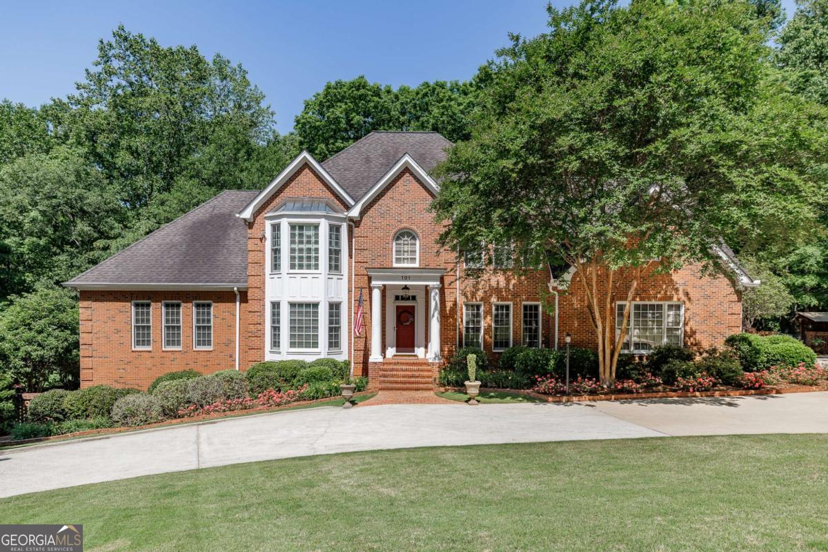 Stunning Executive Home with Luxury Amenities & Outdoor Living Located in desirable Georgian Hills, this elegant home is designed for entertaining. The main level flows seamlessly from formal living and dining rooms through a chef's kitchen into the spacious great room and out to a pergola-covered patio. Multiple decks lead to beautifully landscaped garden paths and a tranquil fountain sitting area. Enjoy two luxurious owner's suites-one on the main level and another upstairs-plus three additional bedrooms and a full bath. The terrace level features a private in-law suite with separate entrance, a large rec room, kitchenette, and powder room. Perfect for hosting guests or extended family, this home offers space, comfort, and timeless style. Don't miss your opportunity to experience refined living in a truly exceptional setting. This Middleton Court property is close to downtown Athens, UGA, and all our wonderful area has to offer. Schedule your showing today!