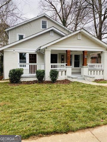 City of Decatur transformation in the heart of walkable Oakhurst Village! This beautifully updated 3-bedroom bungalow at 443 3rd Avenue offers the best of in-town living-just steps from over 60 shops, restaurants, grocery stores, coffee spots, parks, and libraries. You'll also enjoy easy walking or biking access to Emory University and the CDC, with all of Atlanta just minutes away. Perched across from a dedicated city-owned greenspace, this home features refinished original hardwoods, updated bathrooms, and major system upgrades including a new water heater, insulation, HVAC, plumbing, and electrical-blending classic charm with modern reliability. The bright, all-white kitchen includes new appliances, a tucked-away laundry system, and abundant hallway storage. The family room boasts a serene front-yard view, while outside you'll find a private driveway, on-street parking, manicured landscaping, and a generous backyard-perfect for gardening, play, or entertaining. Make this charming home your next address in vibrant Oakhurst.