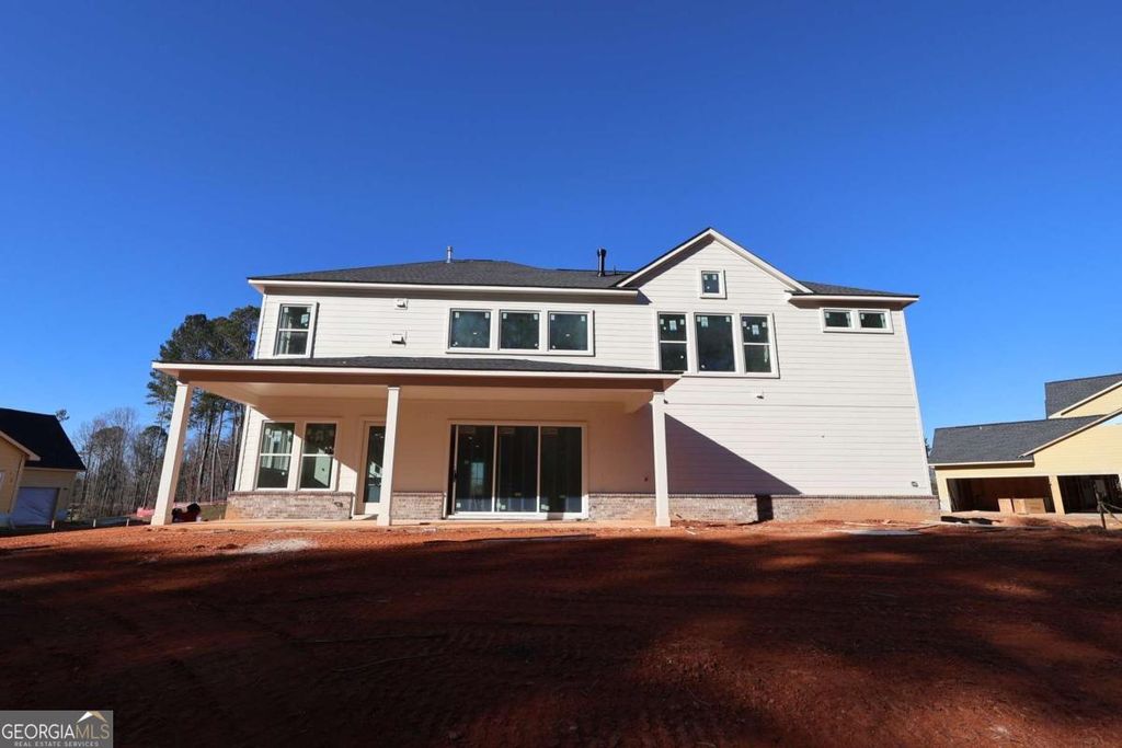 Photo of 7385 Magnolia Crest Ln, Cumming, GA 30028 (MLS # 10696925)