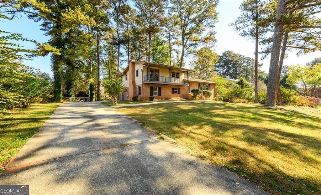 Photo of 462 Emily Drive SW, Lilburn, GA 30047 (MLS # 10868234)