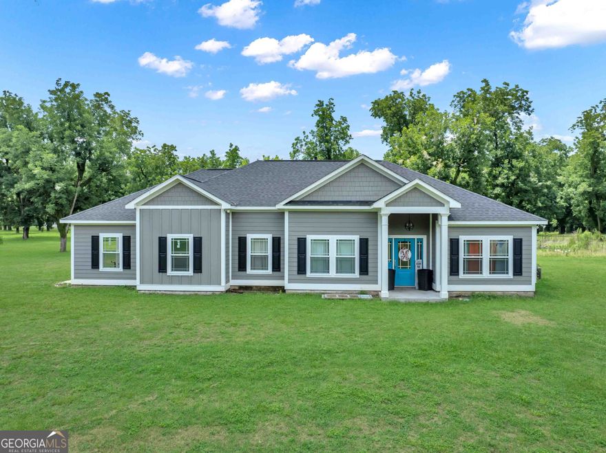 USDA Eligible!! 2 ACRES!!! 4 Bedrooms and 3 Full Bathrooms! Located in Baconton GA! Experience luxury living in this 2019-built home, featuring an open floor plan perfect for entertaining and a spacious family room designed for comfort and functionality. The gorgeous kitchen offers a functional design with plenty of storage, a large pantry, stainless steel appliances, and a breakfast bar, making it an ideal space for family gatherings. Enjoy the natural light surrounding you in the spacious dining area. The master bedroom is a tranquil retreat, complete with wooden floors and a private bathroom featuring a clawfoot tub, separate tile shower, and custom-made his and her vanities. The walk-in closet is generously sized, providing ample space for storing clothing and accessories. On the opposite side of the home, two bedrooms each include walk-in closets and a Jack-n-Jill bathroom. This stylish bathroom features two custom-made vanities and a separate area for the toilet and shower. Additionally, a fourth bedroom with a private bathroom and walk-in closet is an added bonus to this impressive home. Additional features include: a nice mud room area with built-in storage, a spacious laundry room, a large covered back porch, a single car garage with a large storage room, and NO REAR NEIGHBORS! Call a Realtor for your appointment to view this home TODAY!!