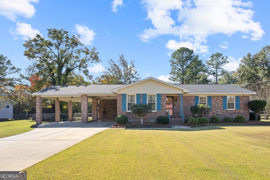Move right in to this well-maintained 3-bedroom, 2-bath all-brick home featuring an open floor plan and renovated kitchen. Recent updates include new flooring and a 2-year-old roof. Enjoy outdoor living with a landscaped yard and enclosed back porch-perfect for relaxing or entertaining. The property also offers three outbuildings for storage or hobbies and a 2-car carport. This updated home is truly turn-key and ready for its next owner!